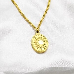 Gold Sun and Moon Oval Pendant Necklace